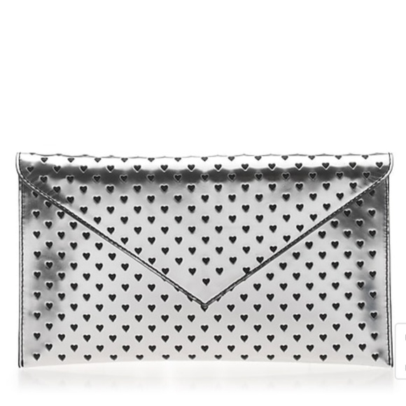 J. Crew Handbags - NWT J. Crew Silver Clutch Perforated Hearts